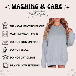 May include: A light gray long-sleeve sweatshirt with washing and care instructions text: WASHING & CARE INSTRUCTIONS, TURN GARMENT INSIDE OUT, MACHINE WASH COLD, DO NOT IRON ON PRINT, DO NOT BLEACH, DO NOT DRY CLEAN, and DRY ON LOW SETTINGS.