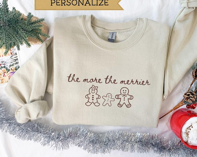 Christmas Pregnancy Reveal Announcement Sweatshirt, The More The Merrier Baby Reveal Sweatshirt, Cute Pregnancy Sweater, Baby Shower Sweater