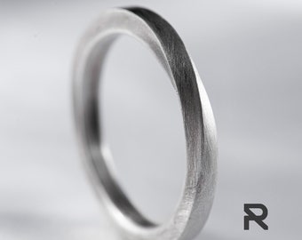 Infinite Loop Silver Ring - Handmade with Elegant Twisted Design