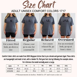 May include: Size chart for Adult Unisex Comfort Colors 1717 shirts. The chart shows how the shirts fit: Fitted, Regular, Relaxed, and Oversized. Measurements are in inches. The model is 5'8" and wears a size 10.