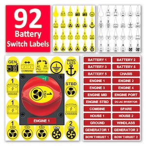 May include: A set of 92 yellow and black battery switch labels for boats. The labels include text such as "Engine 1", "Battery 1", "Windlass", and "Bow Thrust 1".