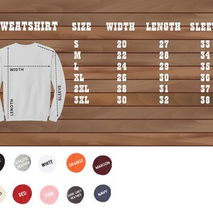 May include: A size chart for a sweatshirt with measurements in inches for width, length, and sleeve length. The chart shows sizes from S to 3XL. The sweatshirt is available in 10 colors: black, athletic heather, white, orange, maroon, sand, red, pink, dark grey heather, and navy.