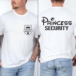 Princess Security Shirt – a funny and stylish Dad sweatshirt, perfect for Disney dads! Whether you're keeping the little ones safe at Disneyland or looking for a unique gift, this shirt is great for Father’s Day, birthdays, or as a gift for your boyfriend. Ideal for a Disneyland family trip, this shirt adds a fun touch to your Disney adventures while showing off your dad pride. Comfy, humorous, and perfect for making memories with your family!