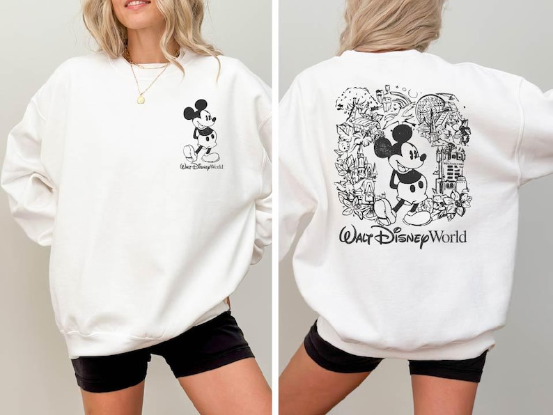 Mickey sketch sweatshirt inspired by Walt Disney World style. Cozy unisex crewneck sweatshirt perfect for Disney World vacation outfits and family matching looks. Soft and comfortable Disney trip sweatshirt ideal for park days, travel, or casual wear. Minimal sketch Mickey design makes this sweatshirt perfect for couples, families, or group Disney vacations. Cute and timeless Disney park apparel.