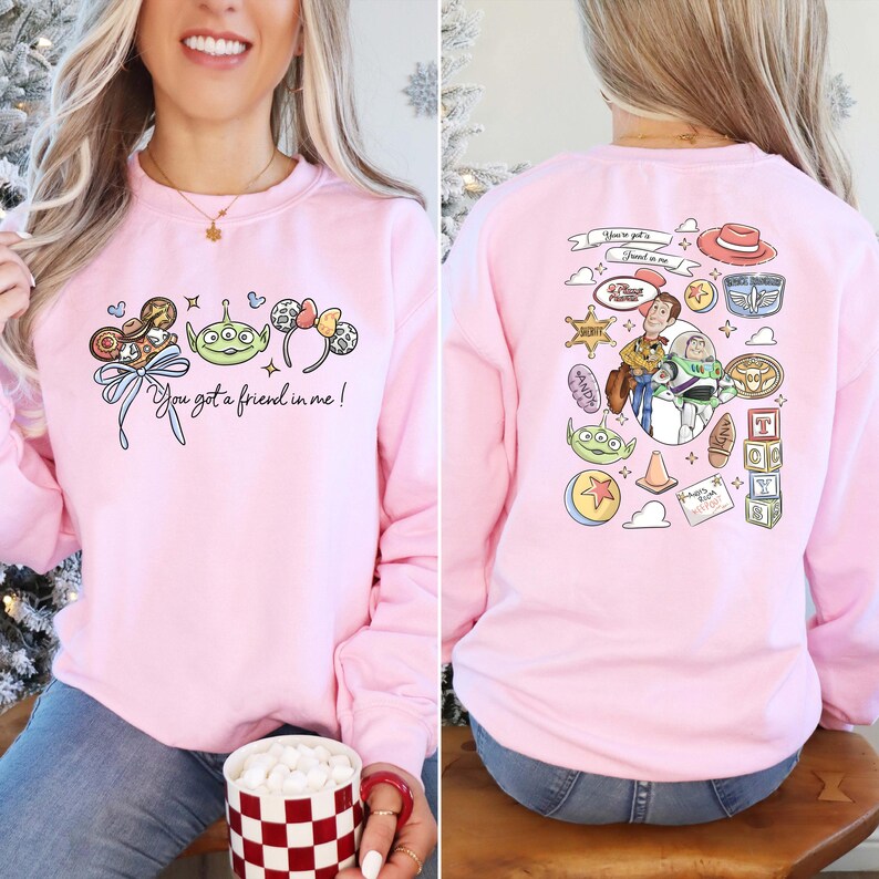 Disney Pixar Toy Story sweatshirt and hoodie featuring Woody, Buzz Lightyear, Rex, Hamm and Pizza Planet inspired design. Cozy unisex crewneck sweatshirt perfect for Disney park trips, Pixar fans, and family matching outfits. Soft and comfortable Disney sweatshirt ideal for Disneyland or Disney World vacations, travel days, or casual wear. Fun Toy Story sweatshirt great for kids at heart and Disney lovers.