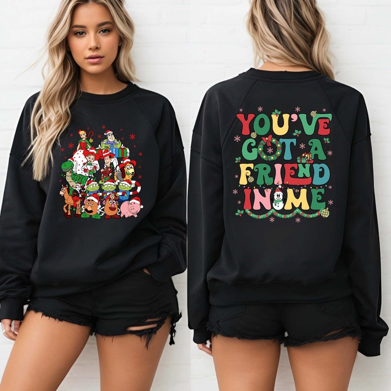 Celebrate the holidays with this festive Toy Story Christmas shirt featuring Woody, Buzz, and friends in a cheerful holiday design. Perfect for Disney family Christmas parties, group photos, or cozy winter park visits. Soft and vibrant, it’s a magical way to say "You've Got a Friend in Me" this season.