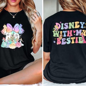 Disney 'With My Bestie' Princess Shirt featuring a cute Minnie Head design on a soft Comfort Colors tee. Perfect for Disney World girls' trips, matching best friend outfits, or a magical day at Magic Kingdom. Stay stylish and comfy while making unforgettable memories