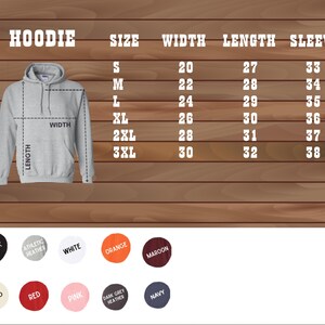 May include: A size chart for a hoodie with measurements in inches for width, length, and sleeve length. The chart shows sizes from S to 3XL. The hoodie is available in a variety of colors, including black, athletic heather, white, orange, maroon, sand, red, pink, dark grey heather, and navy.