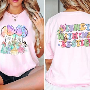 Disney 'With My Bestie' Princess Shirt featuring a cute Minnie Head design on a soft Comfort Colors tee. Perfect for Disney World girls' trips, matching best friend outfits, or a magical day at Magic Kingdom. Stay stylish and comfy while making unforgettable memories