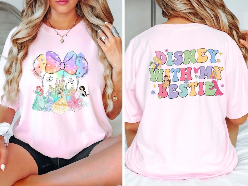 Disney 'With My Bestie' Princess Shirt featuring a cute Minnie Head design on a soft Comfort Colors tee. Perfect for Disney World girls' trips, matching best friend outfits, or a magical day at Magic Kingdom. Stay stylish and comfy while making unforgettable memories