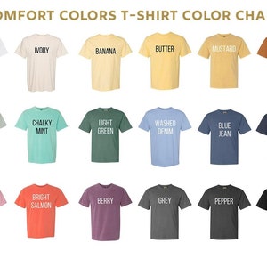 Puede incluir: Una tabla de colores que muestra 18 colores de camisetas diferentes de Comfort Colors. Los colores est&aacute;n dispuestos en tres filas de seis. Los colores son: Blanco, Marfil, Pl&aacute;tano, Mantequilla, Mostaza, &Ntilde;ame, Bah&iacute;a, Menta cremosa, Verde claro, Denim lavado, Vaquero azul, Denim, Flor, Salm&oacute;n brillante, Baya, Gris, Pimienta, y Negro.