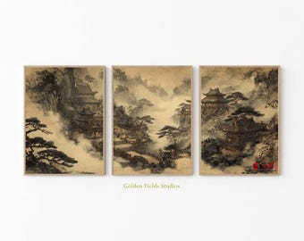 Op de afbeelding: Drie ingelijste prints met een traditioneel Aziatisch landschap. Het kunstwerk toont tempels, bergen en bomen in mist, weergegeven in gedempte bruin-, grijs- en beigetinten. De tekst "Golden Fields Studios" is zichtbaar onderaan.