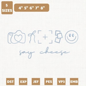 May include: A light blue embroidery design featuring a camera with a heart, a bow, a camera focus, photo frames, and a smiley face. The text "say cheese" is included. Available in 5 sizes, from 4" to 8".