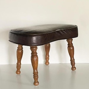 Mid Century Leather Footstool | Kidney Ottoman, Turned Wood Legs, Vintage Danish Modern