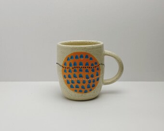 Small Orange and Turquoise Ceramic Oval Mug holds 8 ounces