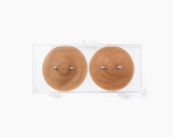 NIKKYS NIPS Pierced Nipple Pasties - The Subtle in Bronze. Fake Nipple Piercings for the pierced look, without the hassle and pain!