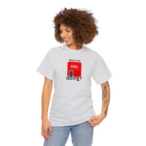 May include: A heather grey t-shirt with a red and black graphic that says "What the HAL are you doing?"