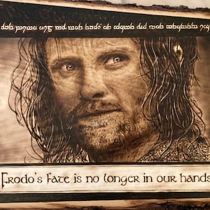 8.5x11in print of Aragorn during the breaking of the Fellowship when he is faced by an impossible choice