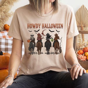 Howdy Halloween T-shirt, Cowgirl Riding T-shirt, Western Halloween T-shirt, Cowgirl Halloween T-shirt, Spooky Western Halloween T-shirt