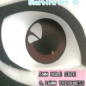 May include: Close-up of a brown eye with a white, perforated design. The eye is set against a white and black background. Text on a pink rectangle reads ".5MM HOLE SIZE" and "0.26MM THICKNESS". The text "Starbird Art" is in the upper right corner.