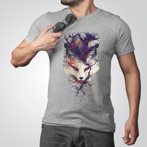 May include: A gray t-shirt with a graphic print of a white fox's face surrounded by purple and red branches.