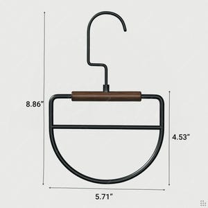 May include: A black metal hanger with a dark wood accent. The hanger is 8.86 inches tall, 5.71 inches wide, and the bottom section is 4.53 inches tall. The design is modern and minimalist, suitable for clothing storage.