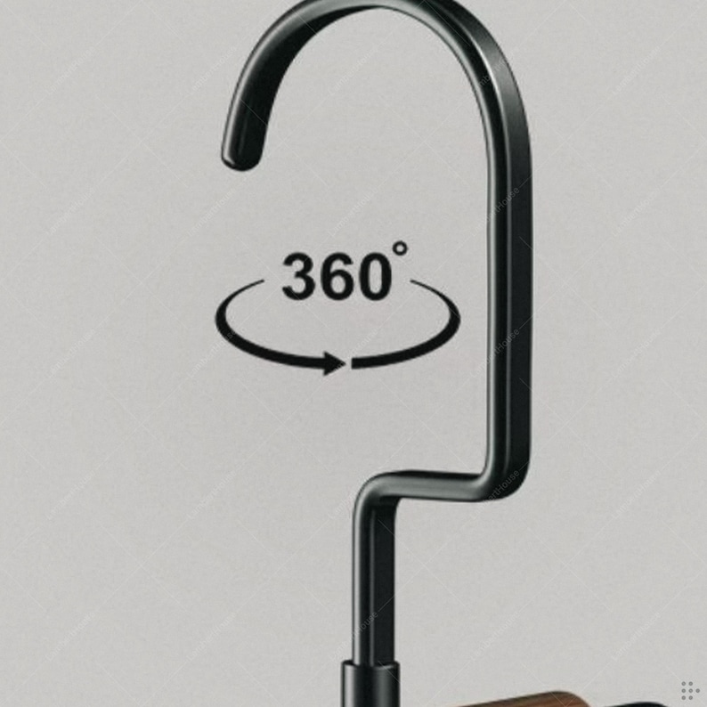 May include: Black metal hanger with a curved top and a 360-degree rotation symbol. The hanger has a sleek, modern design, suitable for organizing clothing. The image is set against a neutral background.