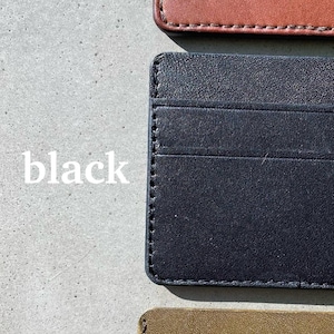 May include: Three leather card holders in brown, black, and olive.