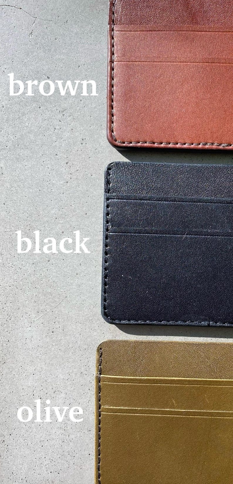 May include: Three leather card holders in brown, black, and olive.