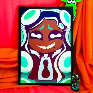 May include: A framed print of a digital illustration of a character with brown skin, green eyes, and white hair wearing headphones. The character is wearing a black and white outfit with a tie. The background is a dark purple with teal and white accents.