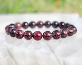 Pulsera de cuentas redondas de granate