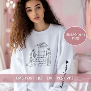 May include: White sweatshirt with a black line drawing of Jesus at the well with the text "Never thirst again" on the sleeve.