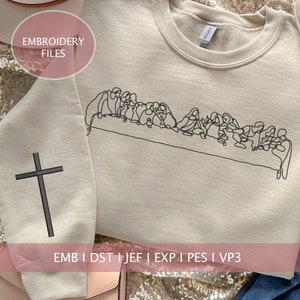 Puede incluir: Una sudadera beige con un dibujo de línea negra de la Última Cena en la parte delantera. El texto "EMB I DST I JEF I EXP I PES I VP3" está impreso en la parte inferior de la sudadera. El texto "EMBROIDERY FILES" está impreso en un cuadrado rosa en la esquina superior izquierda de la imagen.