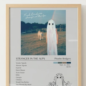 May include: A white album cover with a black and white illustration of a ghost in a field with a dog. The album title is "Stranger in the Alps" by Phoebe Bridgers. The album release date is September 22, 2017, and the runtime is 44:19. The album cover also includes a list of the songs on the album: Smoke Signals, Motion Signals, Funeral, Demi Moore, Scott Street, Killer, Georgia, Chelsea, Would You Rather, You Missed My Heart, and Smoke Signals (Reprise).
