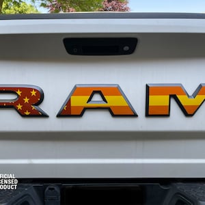2025 RAM 1500 RHO tailgate rear emblem Overlay USA American Flag brown yellow orange