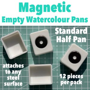 May include: White plastic empty watercolour half pans with circular black magnets on the underside. The text reads Magnetic Empty Watercolour Pans, Standard Half Pan, attaches to any steel surface, and 12 pieces per pack. These are rectangular.