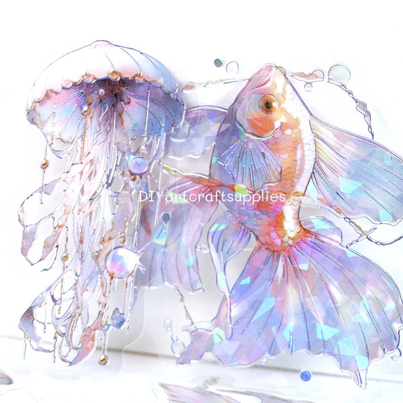 May include: A holographic sticker featuring a jellyfish and a fish. The jellyfish is white with iridescent blue tentacles and the fish is orange with iridescent blue and purple fins.