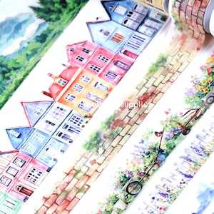 May include: Assortment of colorful washi tapes featuring watercolor illustrations of brick walls, houses, and floral arrangements. The tapes are perfect for adding a touch of whimsy to journals, planners, and other craft projects.