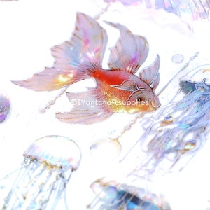 May include: A sheet of iridescent holographic stickers featuring a goldfish and jellyfish. The goldfish is red and gold with a shimmering iridescent finish. The jellyfish are translucent with iridescent blue and purple accents.