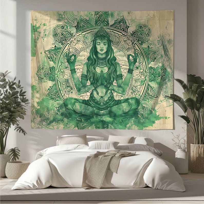 May include: Green tapestry featuring a woman meditating in a lotus position within a mandala design. The woman has long dark hair and is wearing a green outfit. The mandala is intricate and detailed, with a watercolor effect.