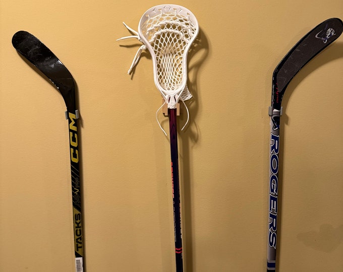 Hockey stick wall mounts