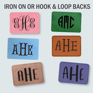 May include: Six rectangular patches with rounded corners in pink, green, light blue, brown, tan, and purple. Each patch features a black monogram or letter design. The text IRON ON OR HOOK & LOOP BACKS is displayed at the top of the image.