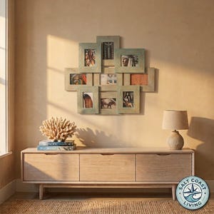 May include: A multi-opening wall collage picture frame set with a weathered light green finish, arranged in a cross-like pattern to hold eight individual photographs, mounted on a plain wall above a light wood media console with a table lamp.