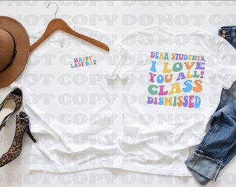May include: Two white t-shirts with colorful text. The front shirt says "Happy Last Day" and the back shirt says "Dear Students, I Love You All! Class Dismissed".