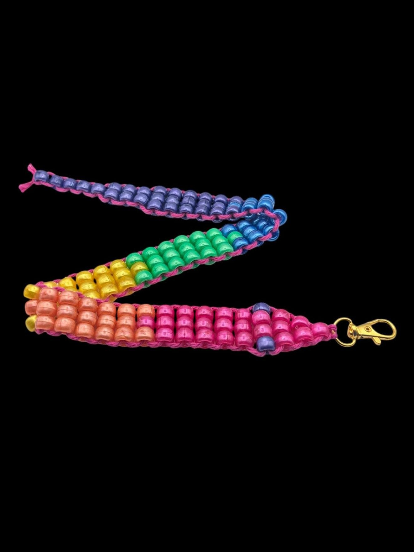 Rainbow Fidget Snake — playful movement for anxious moments - Keychains. Sensory details: 18" Long Design, Clip-on Attachment, Quiet Fidgeting.