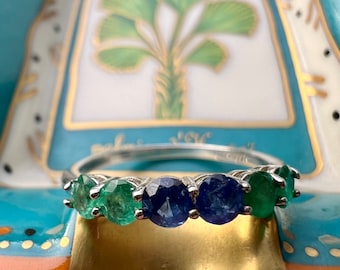 Emerald and sapphire eternity ring