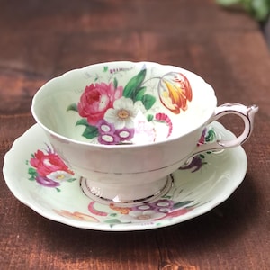 Vintage Paragon By Appointment H.M.The Queen & H.M. Queen Mary Fine Bone China Tea Cup And Saucer. Made in England.