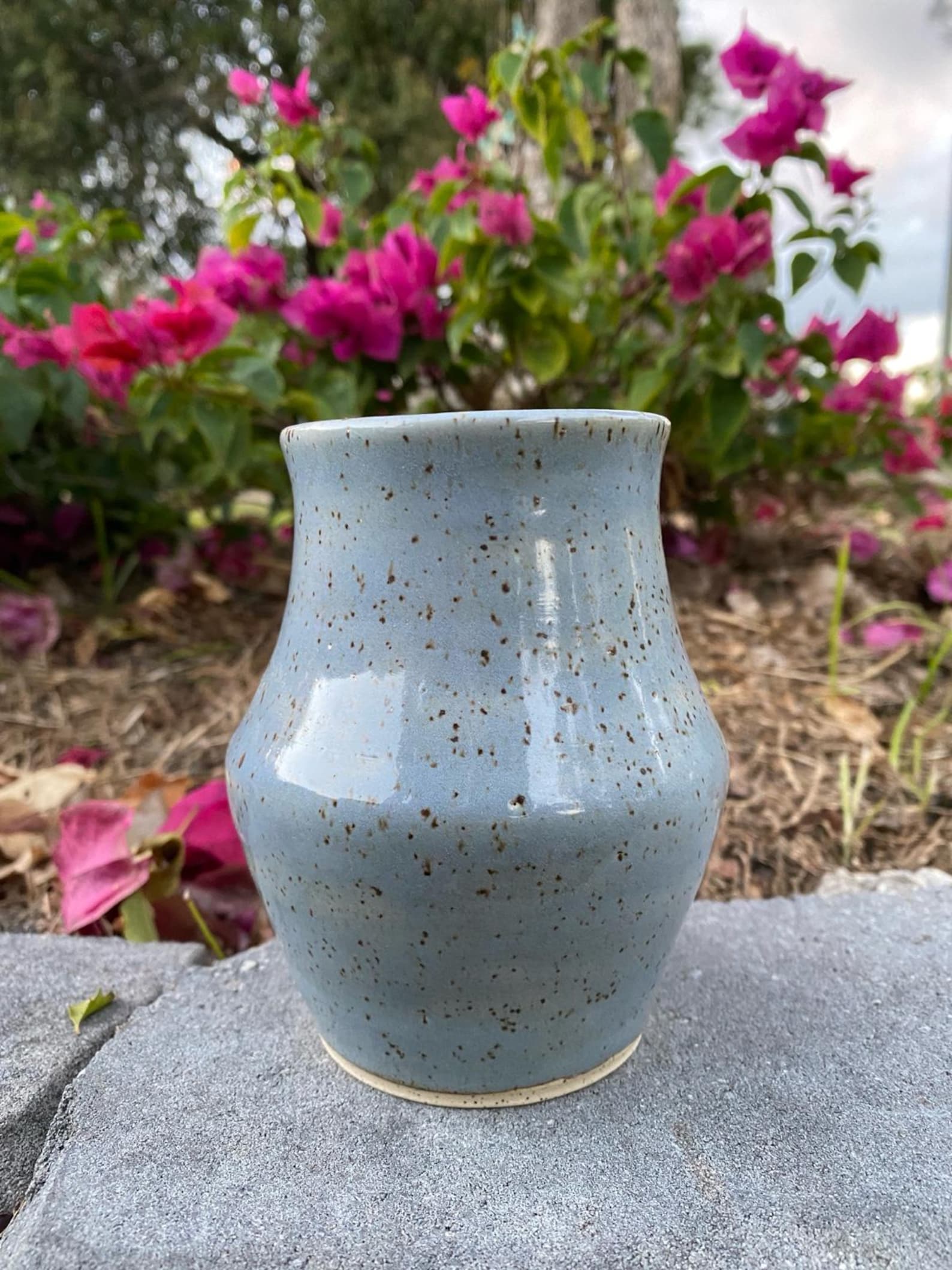 Speckled blue pottery vase for a cowgirl coastal bedroom