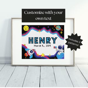 May include: A cross-stitch pattern featuring a rocket, astronaut, planets, and stars on a black background. The pattern includes the name "HENRY" and the date "March 5, 2019".