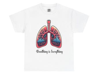 May include: White t-shirt with a red and blue illustration of lungs with musical notes inside. The text "Breathing is Everything" is printed below the illustration.